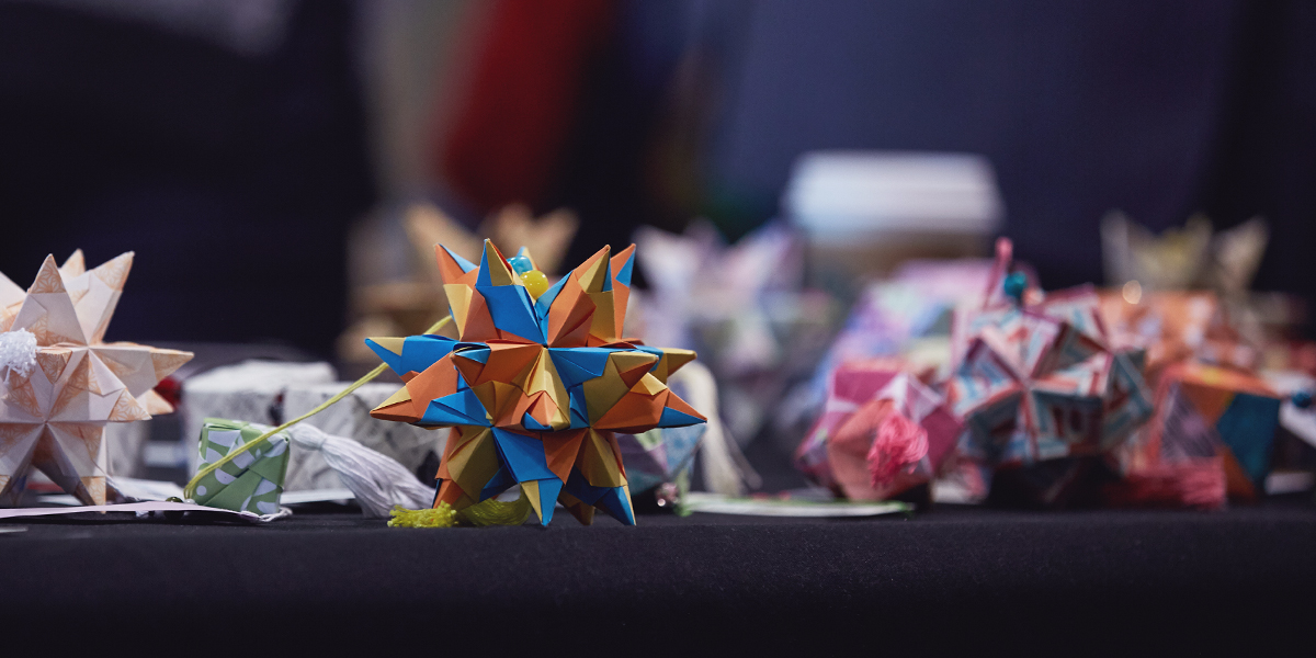 Fossil Group employees and their families had the opportunity to shop and fold origami for Paper For Water