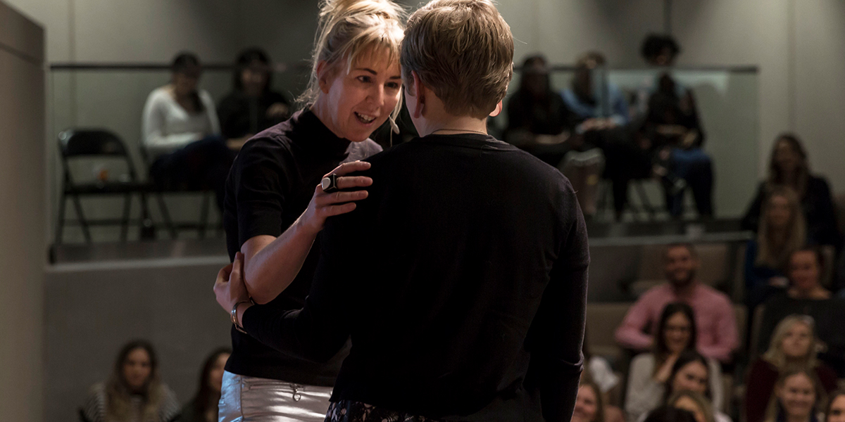 Guest Speaker Caroline Casey talks to Alyssa Mayhaus on stage at Fossil Group headquarters