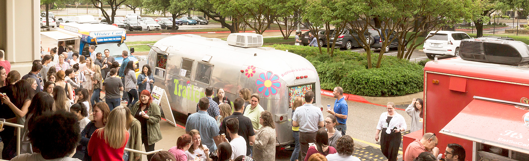 Fossil Group employees enjoy food trucks outside of Texas headquarters