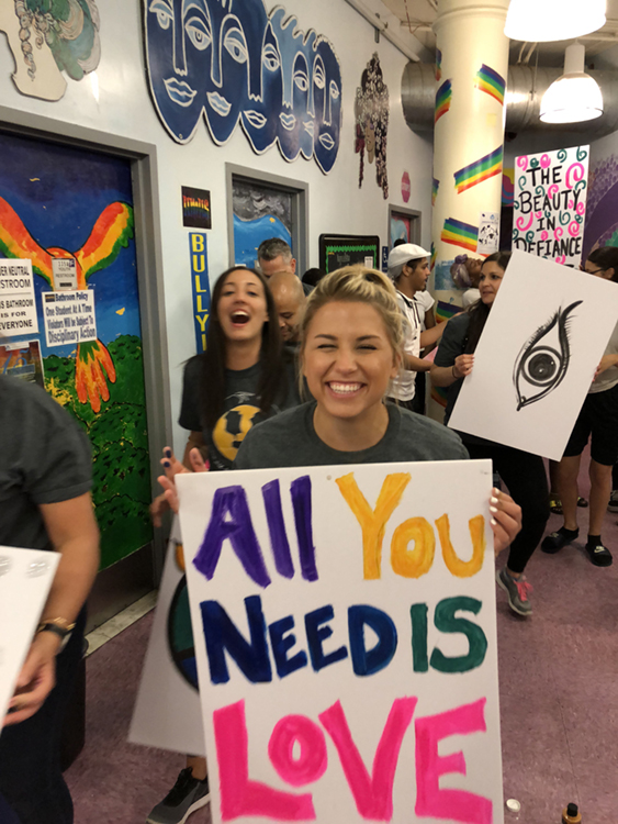 Fossil Group and Hetrick Martin employees make posters for NYC pride parade