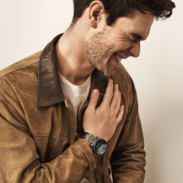 KJ Apa models new heart rate tracking Fossil Touchscreen Smartwatch the Q Explorist 