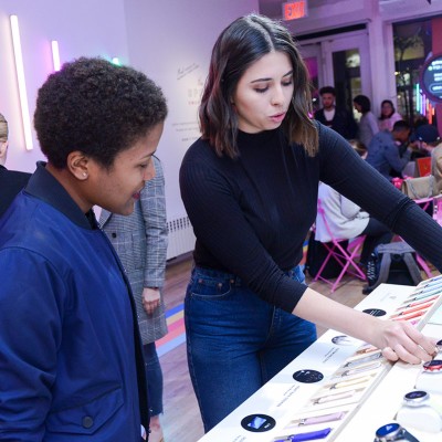 Alison Desir gets the download on the new Fossil sport smartwatch at NYC pop up shop