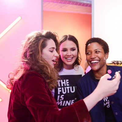 Aija Mayrock, Candice Huffine and Alison Desir take a selfie at Fossil's NYC pop up shop for new sport smartwatch