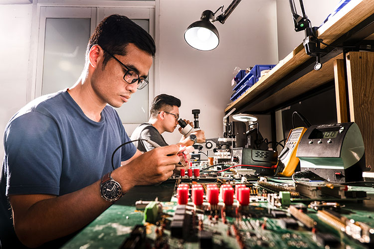 Vietnam Office Mechanical Engineer at Desk